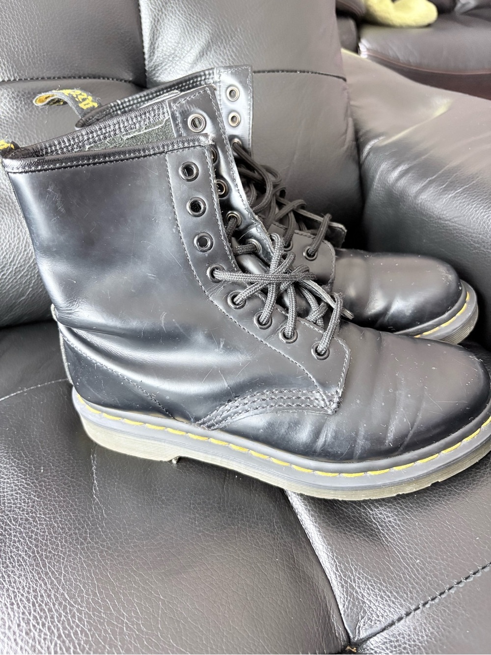 Dr. Martens Black Leather Combat Boots with Yellow Welt Stitching